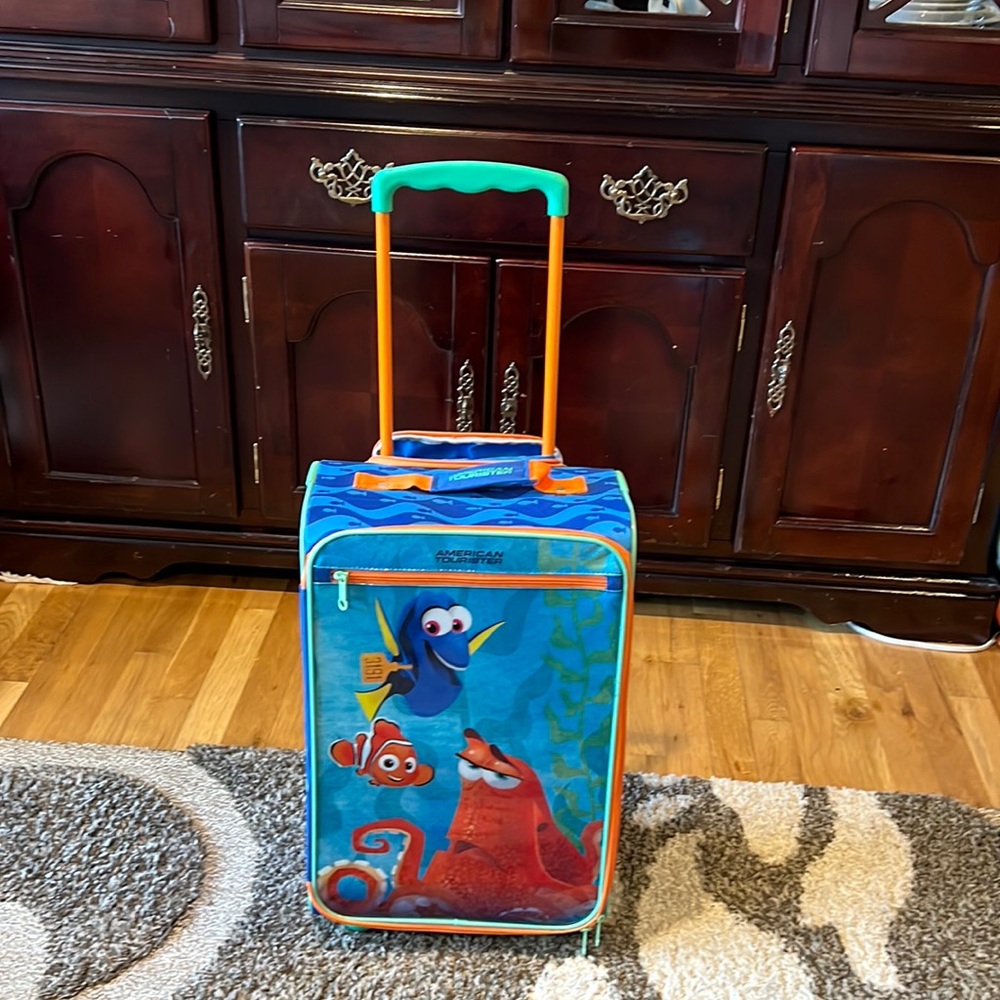 Child Finding Dory carryon American tourister suitcase